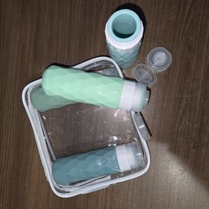 Set of Travel Bottles with Case